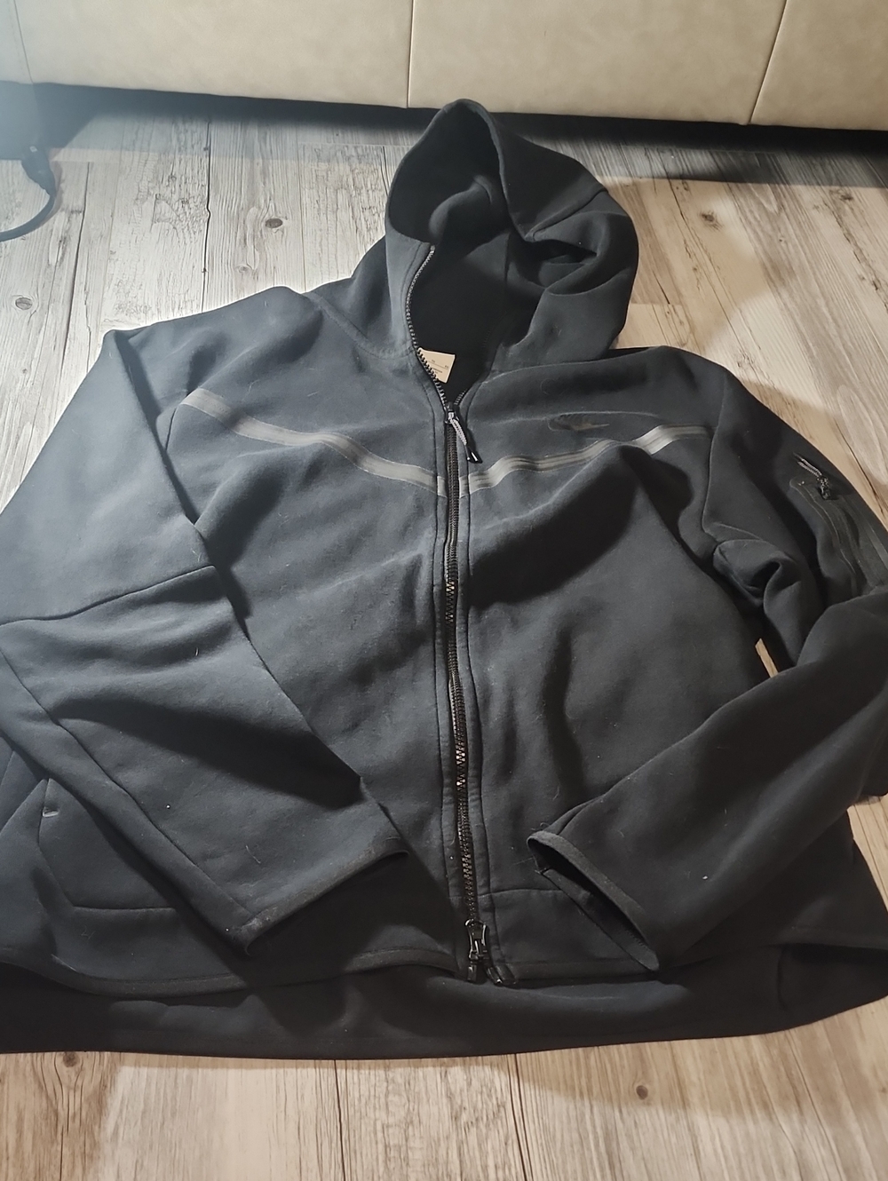 Nike Black Full-Zip Hooded Jacket with Subtle Reflective Trim